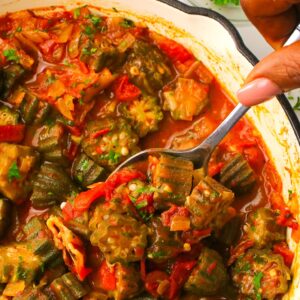 Serving up steaming hot okra and tomato stew