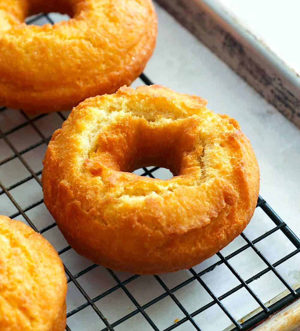 Deliciously craggy surface on a freshly fried cake doughnut