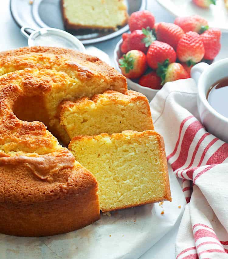 Slicing into a freshly baked Southern pound cake for a happy family