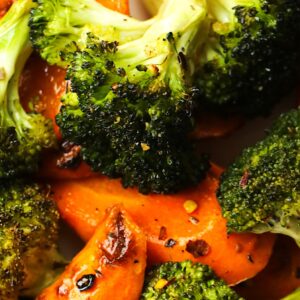 Serving up freshly roasted broccoli and carrots for a quick and easy side dish